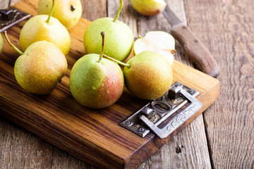 Ripe organic pears on rustic wooden table