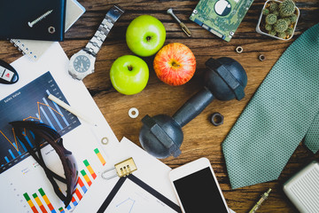 Healthy Business Active lifestyles concept. healthy fruits and active lifestyles, dumbbells,...