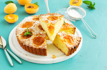Biscuit cake with apricots and almonds.