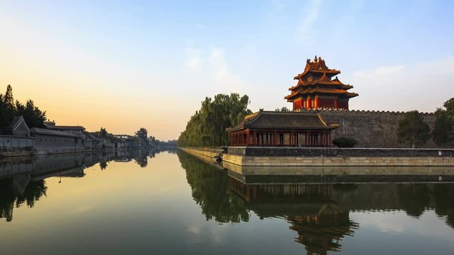 4K zoom in  time-lapse: China Beijing, the Palace Museum (Forbidden City), outer moat at sunrise.