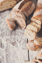 Bread background closeup on wooden table