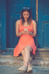 Young female using smartphone
