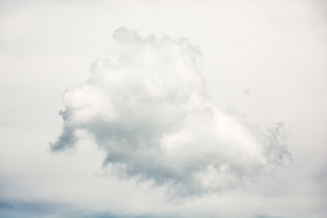 Blue sky with fluffy clouds