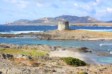 Fototapeta na wymiar Medieval watch tower on the coast of Sardinia Island, Mediterranean Sea, Italy