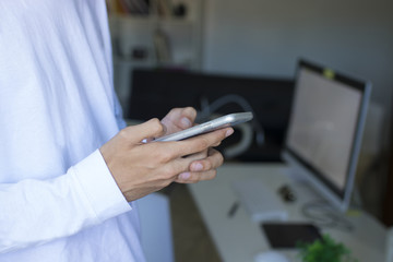 hands with mobile phone