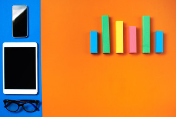Colorful desk with bar charts