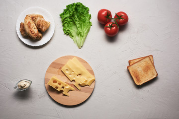 Multiple ingredients combined into a chicken sandwich