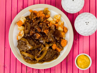 Braised Steak And Root Vegetables With Onion Gravy