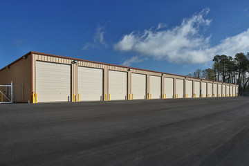 Fototapeta na wymiar Long row of storage pods containers garages during the day