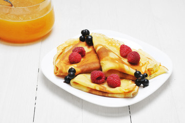 Pancake - Crepes with berries and honey