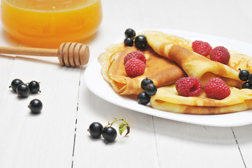 Pancake - Crepes with berries and honey