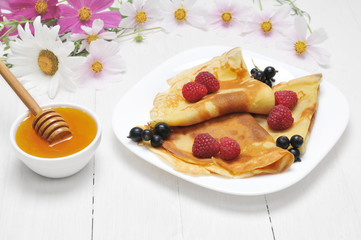 Pancake - Crepes with berries and honey