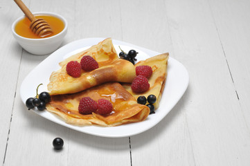 Pancake - Crepes with berries and honey