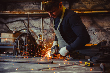 Working saws iron sparks