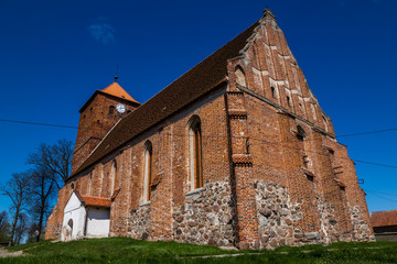 Fototapeta premium Gothic church in Barciany village, Masuria, Poland