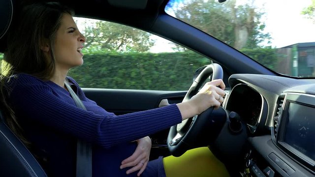 Pregnant woman while driving starting to have contractions