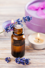Obraz na płótnie Canvas SPA composition with essential oil, lavender flowers