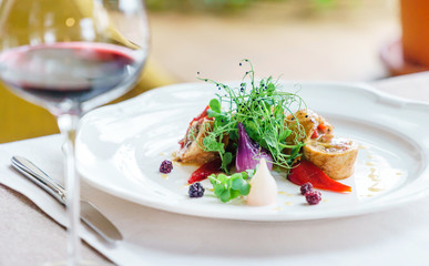 stuffed chicken with roasted vegetables and red wine