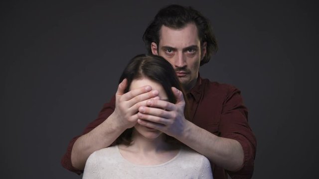 Abuse to woman, gray background