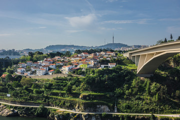 Prince Henry Bridge (Ponte do Infante D. Henrique) over Douro Rive between cities of Porto and Vila Nova de Gaia, Portugal. Prince Henry Bridge: 280 meters arch span and 371 meters length.