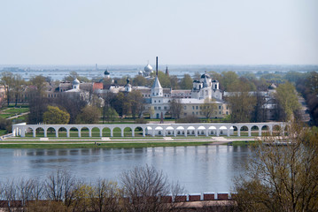 Fototapeta premium View of Yaroslav's court, the trade bank and flooded river Maly Volkhovets from the Kokuy tower, Veliky Novgorod, Russian Federation
