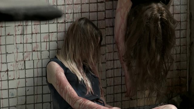 Bloody girls are unconscious in the old building