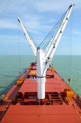 Dry cargo ship with cranes