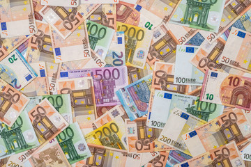 pile of euro banknotes as background - obrazy, fototapety, plakaty
