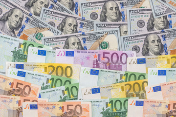 mix dollar and euro bills. background. money.