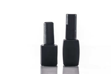Obraz premium Nail art concept. top and base bottle isolated on white