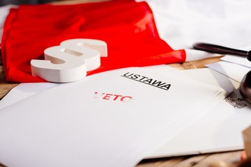 Red veto stamp on law act and Polish flag