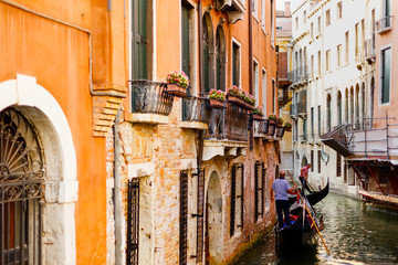 Fototapeta na wymiar Gondola on canal in Venice, Italy