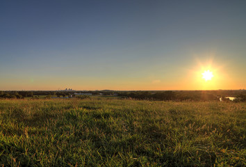 Fototapeta premium The Gateway Arch and St. Louis, Missouri Skyline from Cahokia Mounds.