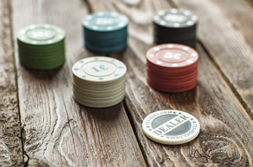 poker chips on wood table