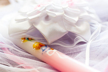 Baby girl christening accessories with candle and flower headband