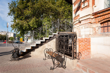 Bench near old building.