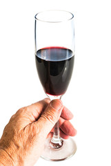 Hand holding a glass of red wine