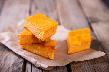 Baking with pumpkin. Autumnal dessert on a vintage wooden background.selective focus.