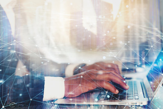 Man working on a laptop. Concept of internet sharing and interconnection