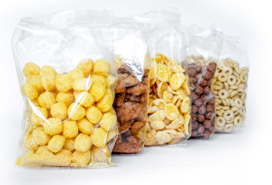 Sealed package of cornflakes vertically isolated on white background