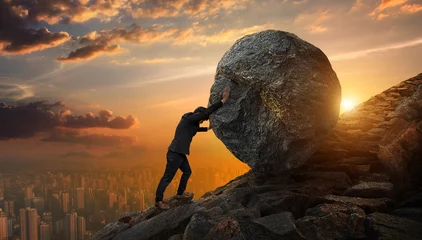Foto op Canvas Business man pushing large stone up to hill , Business heavy tasks and problems concept. © chaiyapruek