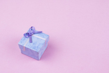 Gift box on a pink background