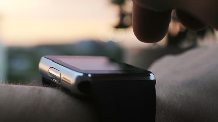 Businessman pointing hand smart watch blurred background wrist using tapping touching man hands closeup macro shooting digitl touchscreen display futuristic tech trendy wearable online smartwatch - Powered by Adobe