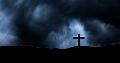 Rain clouds on Christian crosses graves.