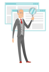 Senior caucasian businessman with magnifying glass