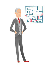 Businessman looking at labyrinth with solution.