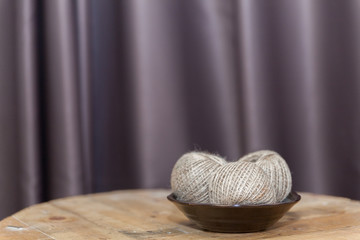 Knitting yarn on plate