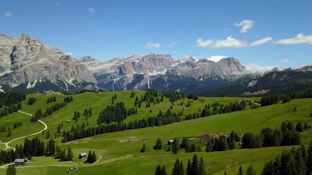 Fantastic landscape on the Dolomites. Drone aerial view on the peaks called Sas Crusc, Lavarela, Conturines, Pizes de Fanis and Lagazuoi. Place is Alta Badia, Sud Tirol, Italy