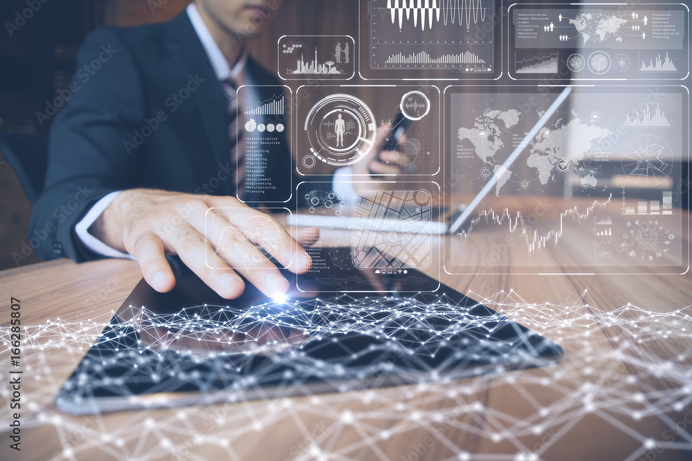 Poster businessman using tablet PC and information communication technology concept. Internet of Things. graphical user interface.