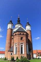 Fototapeta na wymiar Red brick building of the orthodox church of the Annunciation at the monastic complex with defensive features from 16th and 17th century, Podlasie region, Suprasl, Poland